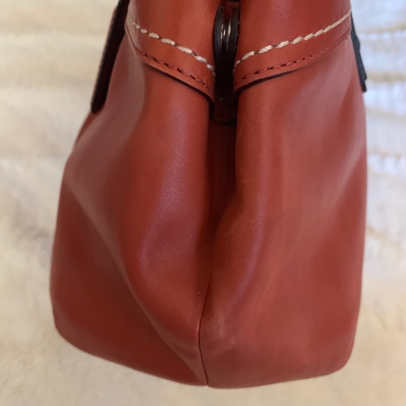 Burnished leather coach purse in burnt orange